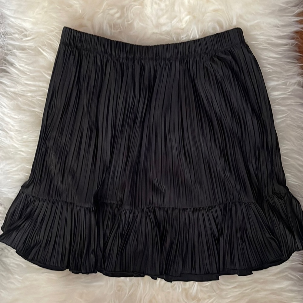 Black pleated satin skirt